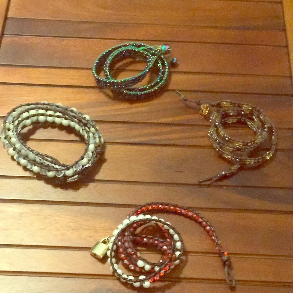 Leather wrapped bracelets crystal, glass, stone.